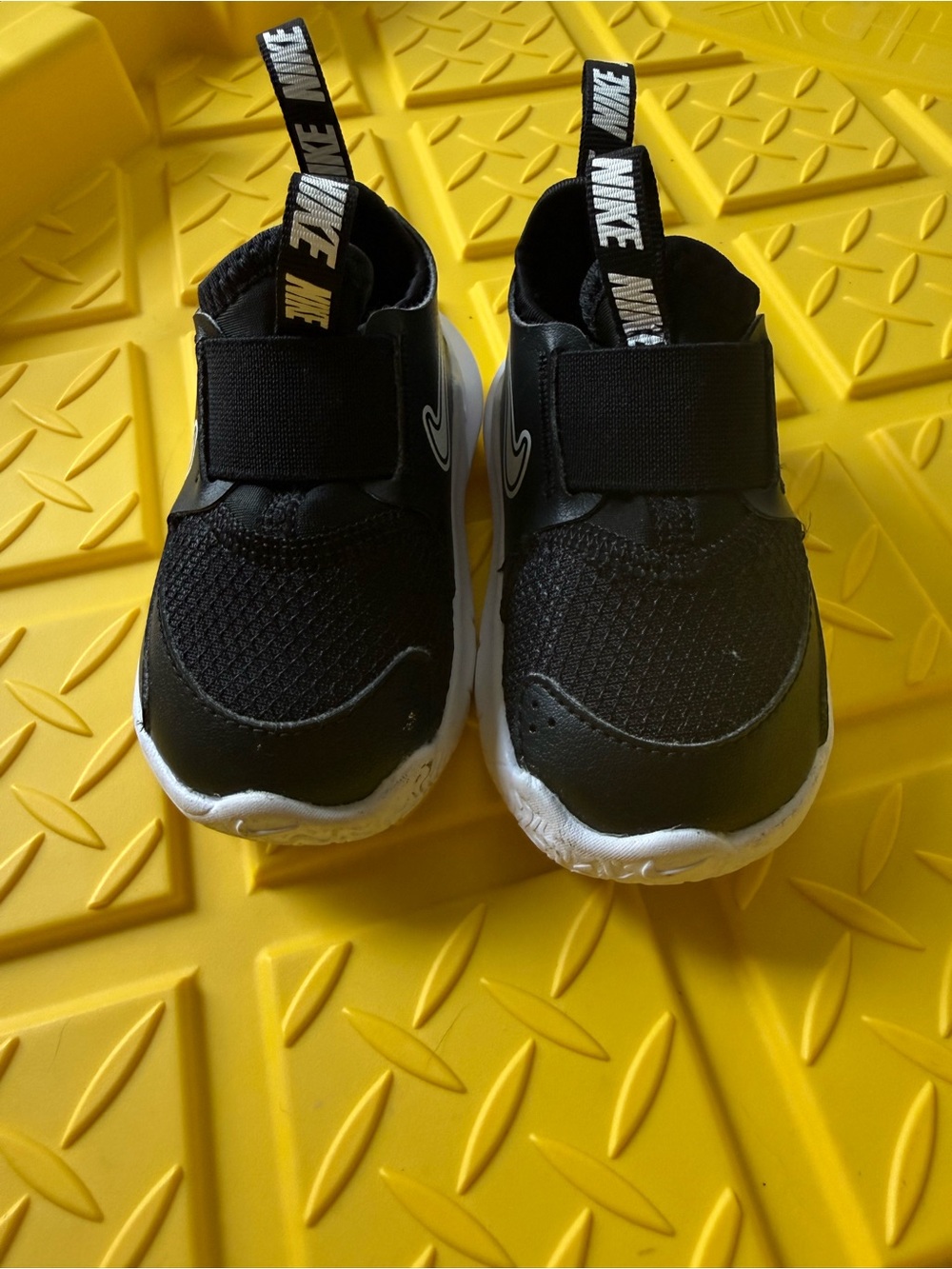 Nike Kids Black and White Slip-On Sneakers
